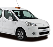 Premier taxi for sale—a white car with a prominent roof sign, shown from the front passenger side on a clean white background.