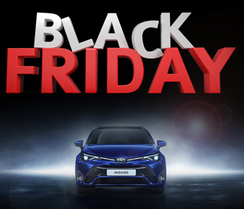 A blue Toyota Avensis taxi with headlights on is positioned below bold Black Friday text—‘Black’ in silver and ‘Friday’ in red—set against a dark background with a spotlight effect behind the car.