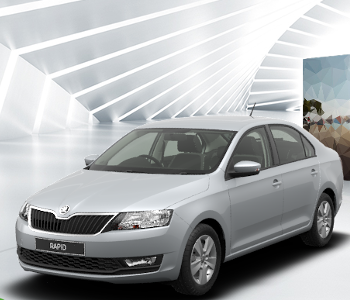 A silver Skoda Rapid SE saloon is shown parked in a modern, brightly lit tunnel with geometric white walls and abstract art, ideal for use as a comfortable taxi.