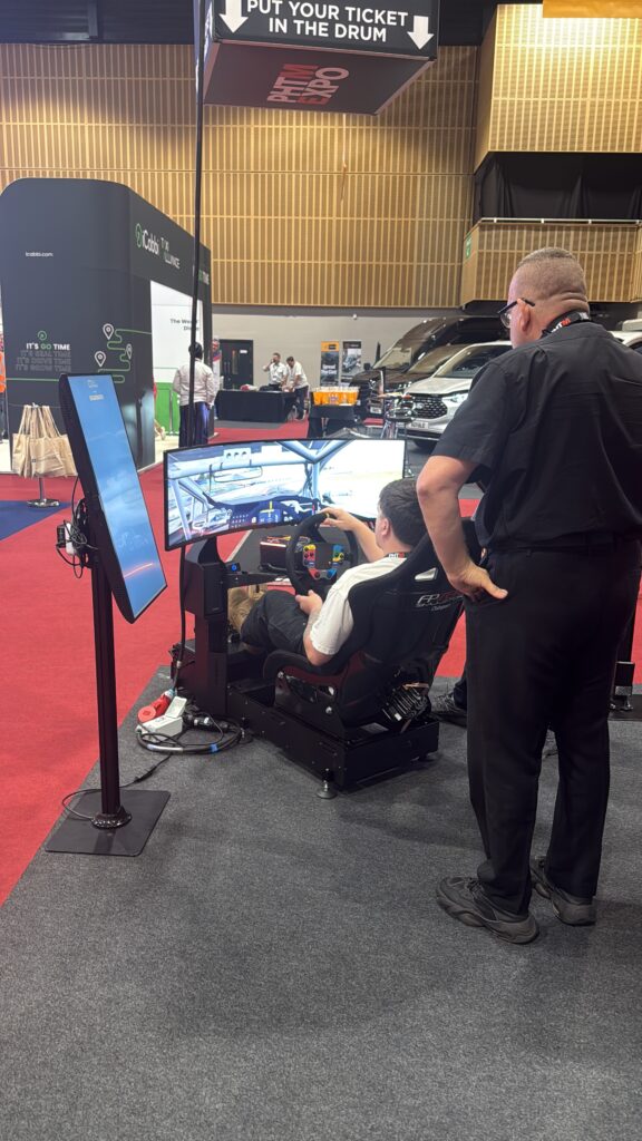 Person racing on a PC simulator